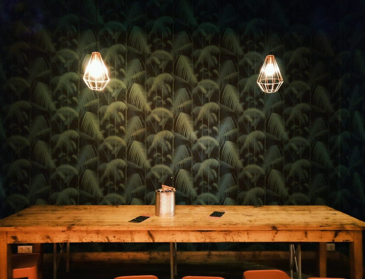 Warm light falling across a wooden table