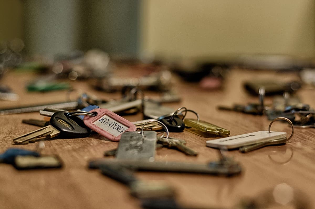 Keys and a keyring on a wooden surface