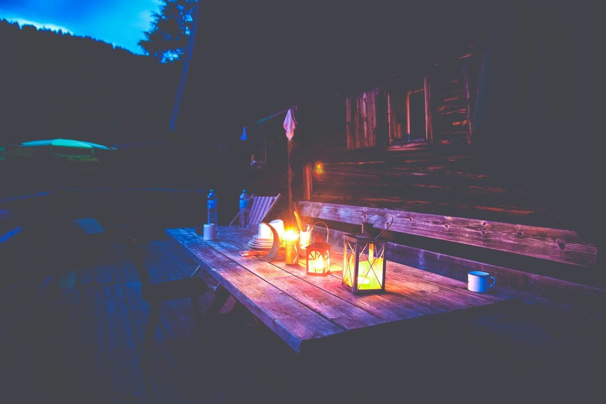 A lantern casting even light across a table