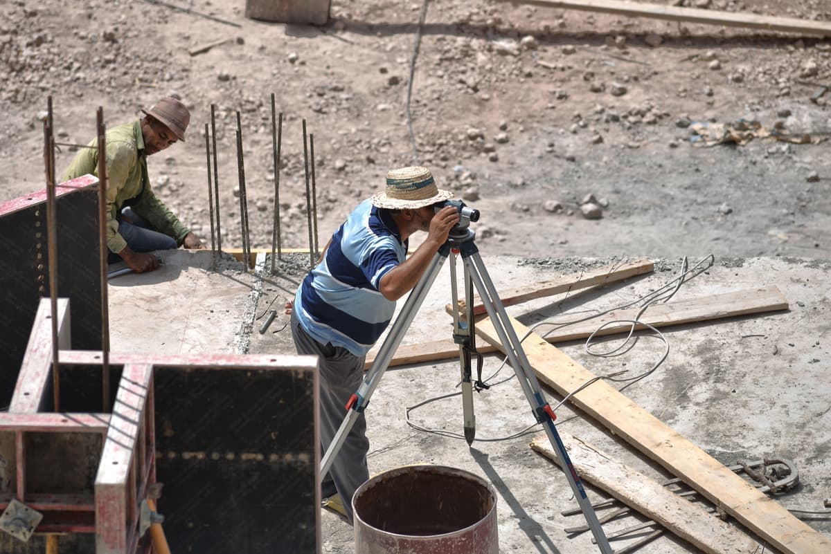 A work light on a tripod at a construction site